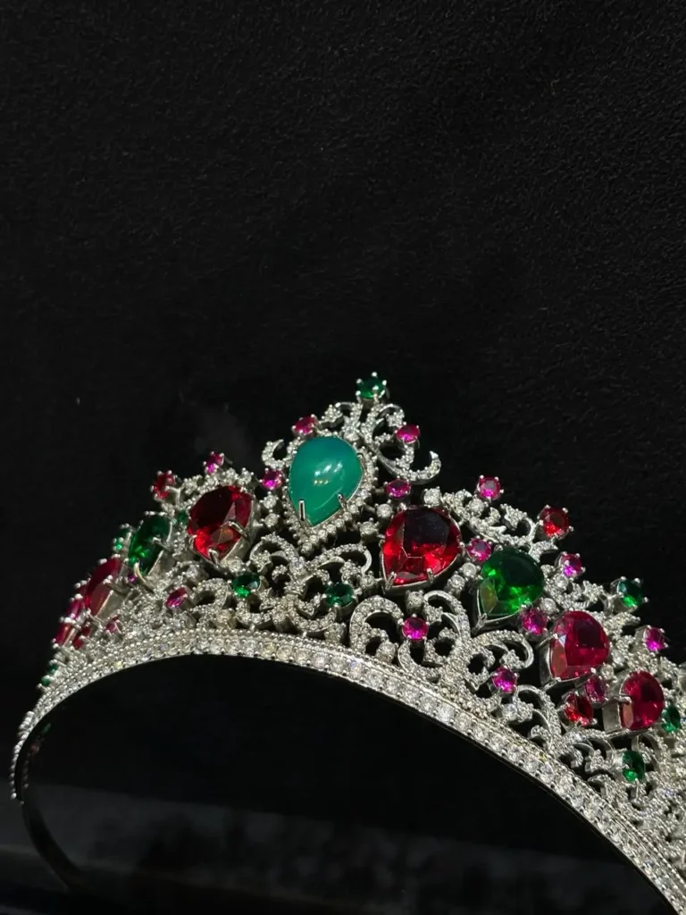 a silver crown made with pure finish with stones embeded on it